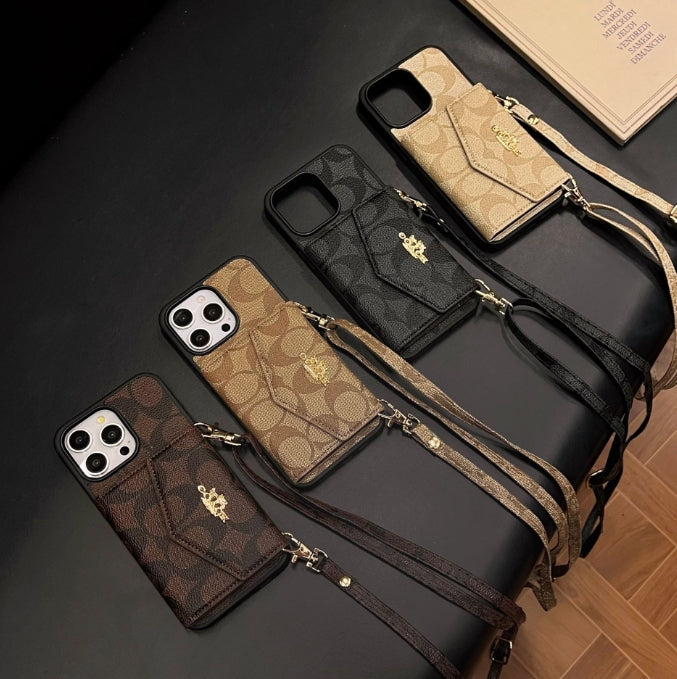 コーチ iPhone ケース カードホルダーとストラップ付き ダーク